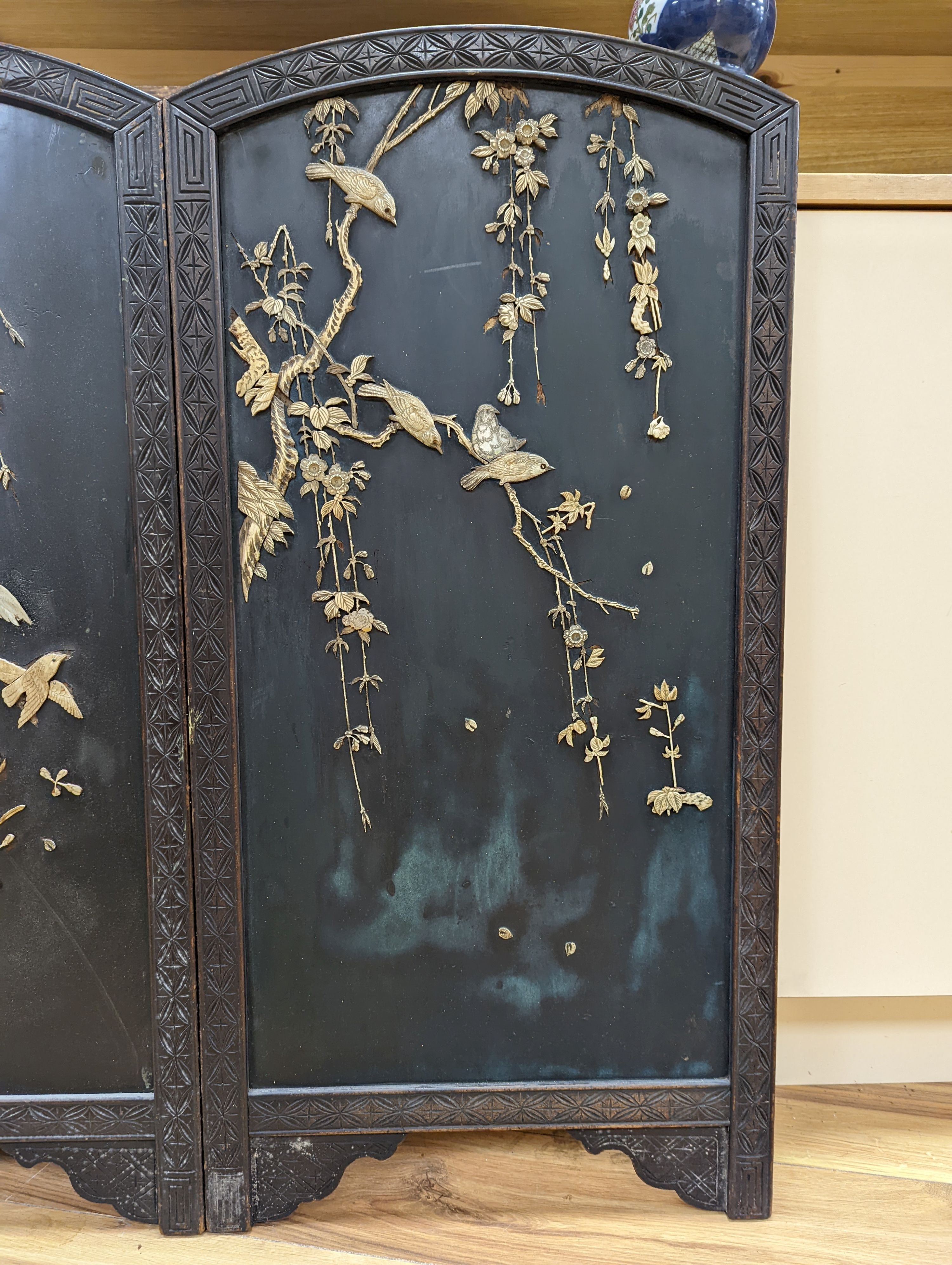 A Japanese bone overlaid lacquer panelled low two section screen, Meiji period 90 x 92cm